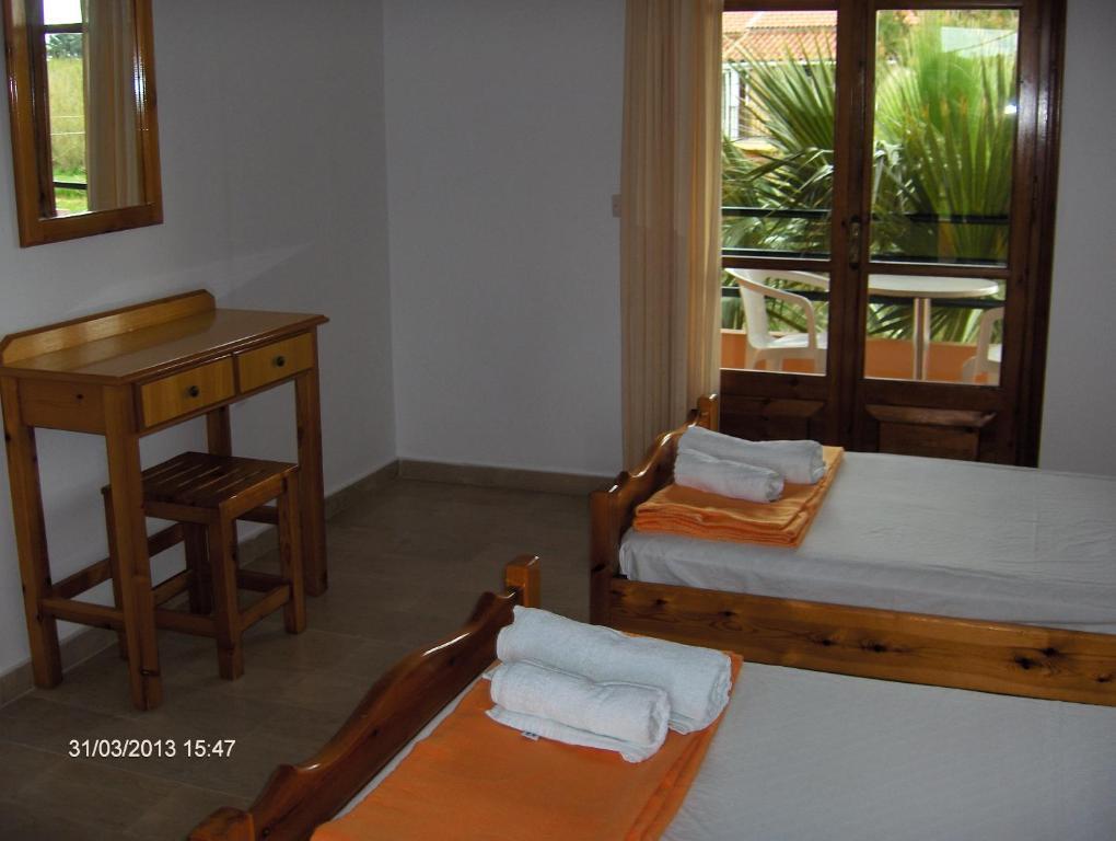 Feakes Apartments Arillas  Pokoj fotografie