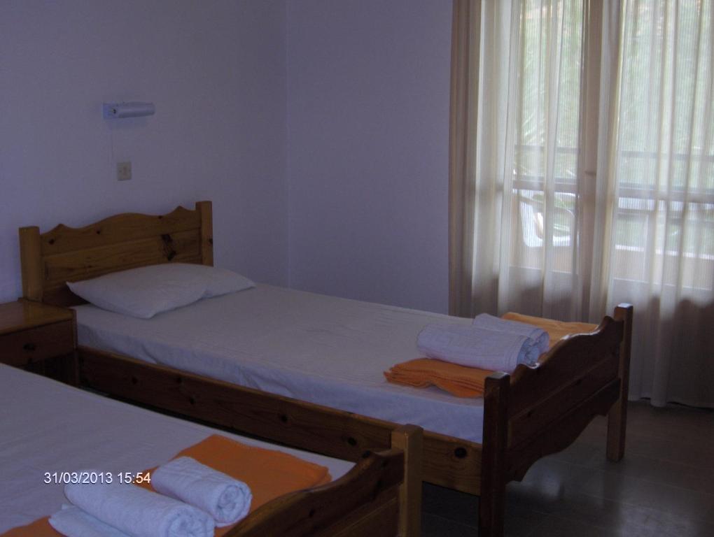 Feakes Apartments Arillas  Pokoj fotografie